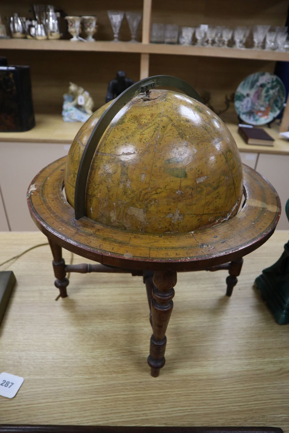 An early 19th century Smiths Celestial table globe, height 46cm (a.f.)